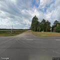 Report of vehicle towing boat driving off roadway