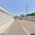 Disabled car with flat tire on Dallas North Tollway
