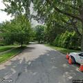 Person lying face down found in grass near East Street