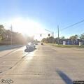 Two-vehicle crash with back and head injuries