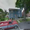 Fire crew checks carbon monoxide alarm