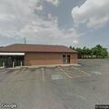 Person looking into cars at shopping center