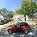 Person experiencing abdominal pain at Sunny Glen Place