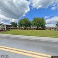 Person suffering difficulty breathing at motel in Bird in Hand