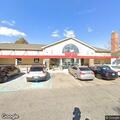 Woman taking photos of people at Wawa store