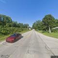 Person with headache near West State Road 32