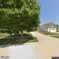 Officer checks home after open garage door