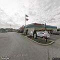 Dog locked in parked vehicle at restaurant lot