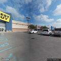 Vehicles racing in Best Buy parking lot