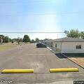 Vehicle hits motel building and leaves scene