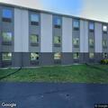 Person suffering nausea and vomiting at motel