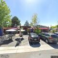 Person unresponsive at cafe carried into gray Lexus