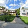 Person experiencing abdominal pain at West Glenside Ave
