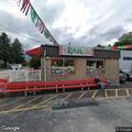 Person experiencing dizziness at local restaurant