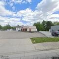Vehicle crashes into pizza shop building
