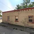 Vehicle crashes into post office building
