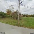 Loose dog dragging leash near Hazel Street home