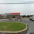 Person experiencing chest pains at convenience store