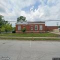 Officer investigates black GMC by Canton post office
