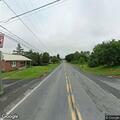 Downed tree and wires causing road closure