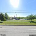 Person experiencing chest pain at church tent
