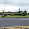Crash leaves debris and fluids on Akron roadway