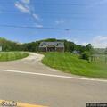 Combine fire along roadway at Kennedy Farm