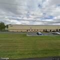 Person with breathing problem at automotive shop