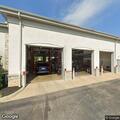 Person experiencing chest pain at car service center