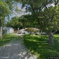 Suspicious persons at house with open door and lights