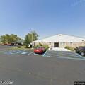 Person experiencing back pain at Hamilton Place apartments