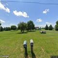 Sick person reported at Crossroads School Road