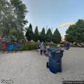 Officer checks possible person or items on park stage