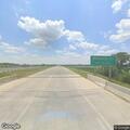 Car traveling the wrong way on highway divider