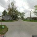 Tree blocks roadway near gas station in Kirklin