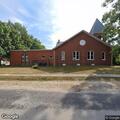 Person having difficulty breathing at church