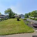 Controlled backyard fire pit at Holland Road home