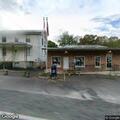 Person experiencing abdominal pain near Dudley