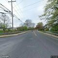 Road blocked by fallen tree near Ridge Avenue