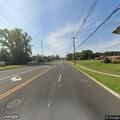 Black Buick reported hitting stop sign at circle