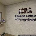 Person experiencing cardiac emergency at therapy center