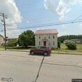 Person experiencing chest pain near West Main Street