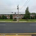 Smoke coming from grass at Broadmoor Apartments