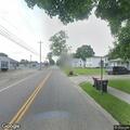 Smoke traced to door burning behind Main Street house