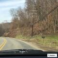 Trash burning near building on Douglas Run Road