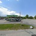 Young woman feels faint and ill at gas station