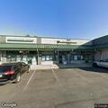 Person vomiting at deli on Jackson Street