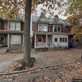 Person experiencing abdominal and chest pain at apartment