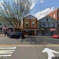 Car parked too close to stop sign near Taco Rito