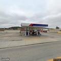Officer checks New Jersey vehicle at truck stop